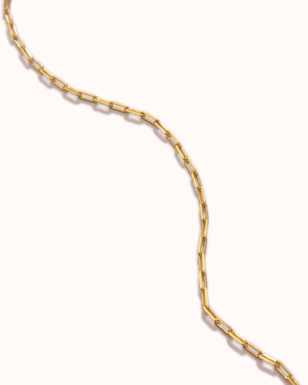 Classic Mini Paperclip Chain Bracelet in sterling silver 18K gold planting with a minimalist, modern design.