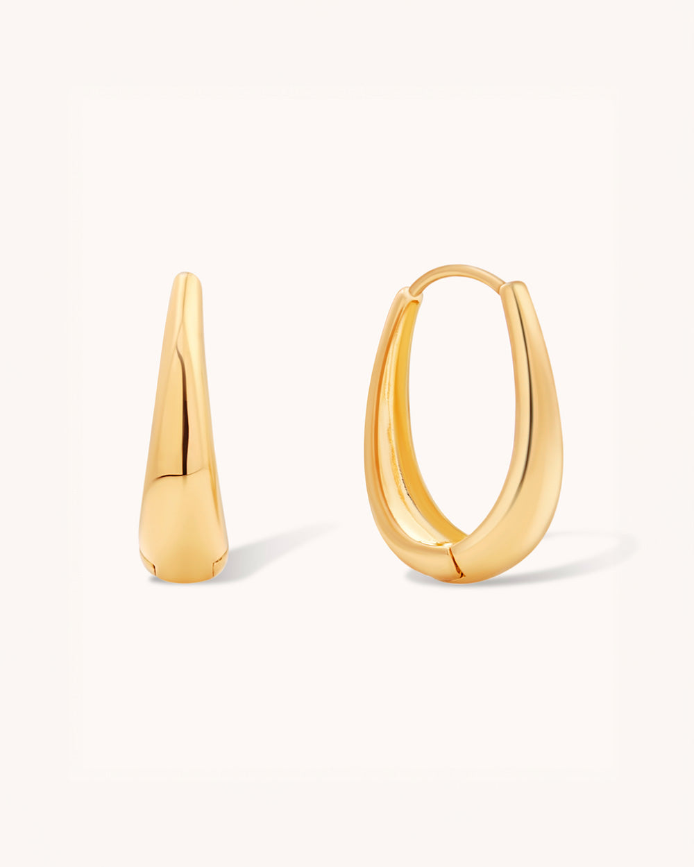 Large Hoops are crafted with lustrous 18k gold, creating a perfectly smooth and shiny finish. 